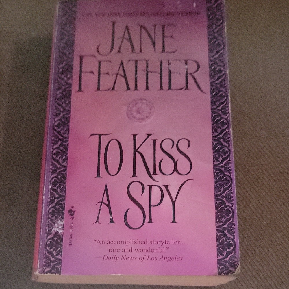 4/$9- Pink 'To Kiss a Spy' Paperback Book